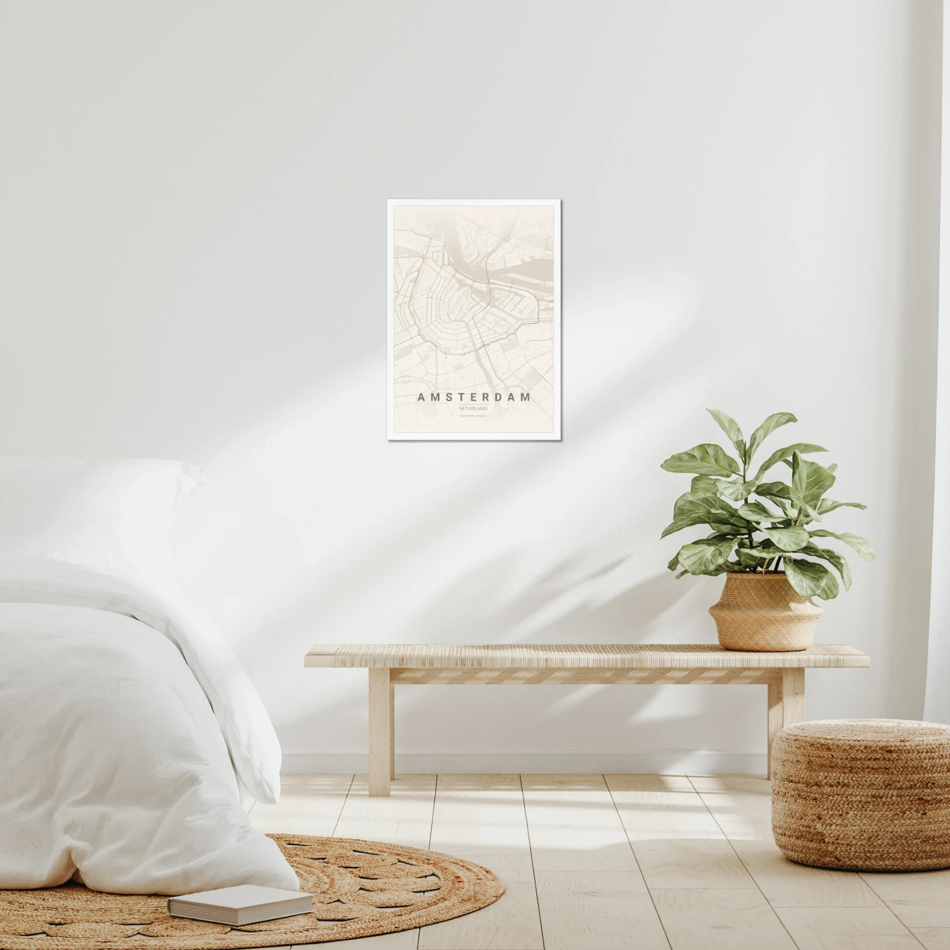 Amsterdam map poster in a white A2 frame, hung in a bedroom